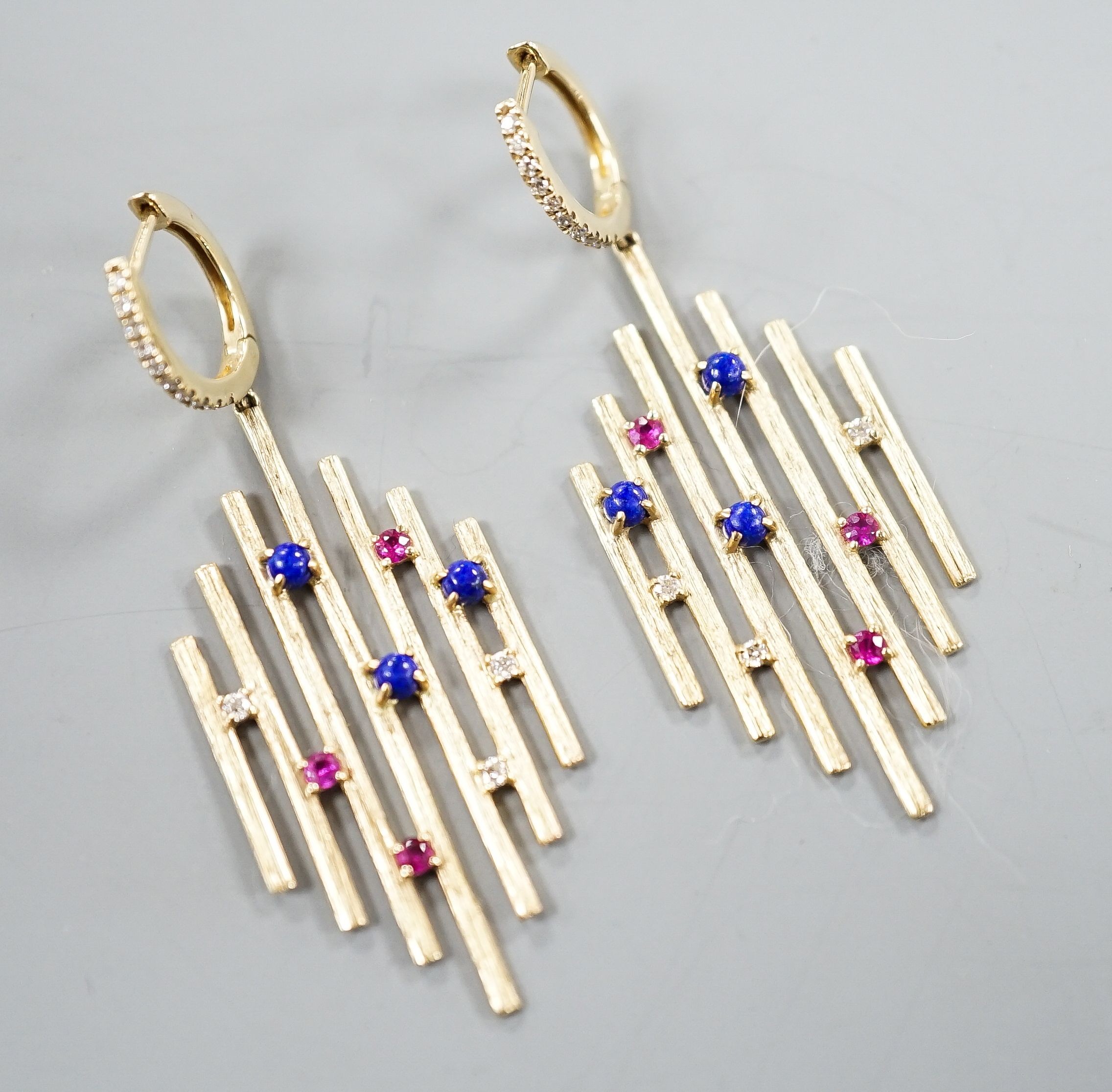 A pair of modern 585 yellow metal, ruby, lapis lazuli and diamond set Dynasty earrings, overall 48mm, gross weight 6.4 grams.